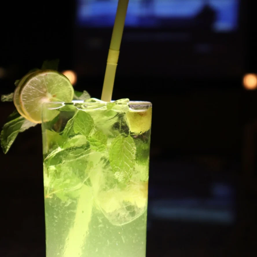 A tall mint and lime cooler