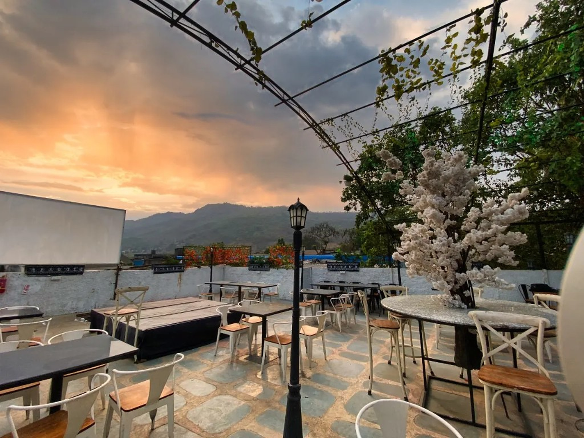 Golden sunset beyond the terrace and the hills